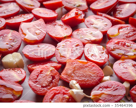 Red heirloom tomatoes with olive oil Red heirloom tomatoes with olive oil 35464396