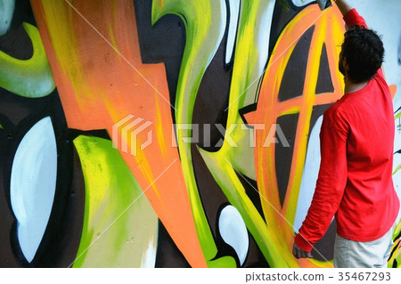 Graffiti on a fence. Graffiti on a fence. 35467293
