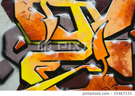 Graffiti on a fence. 35467333