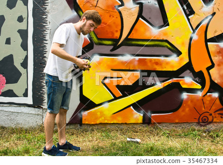 Graffiti on a fence. Graffiti on a fence. 35467334