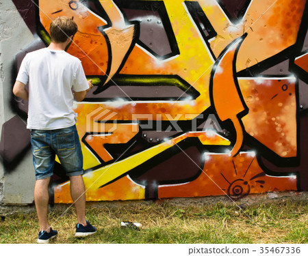 Graffiti on a fence. Graffiti on a fence. 35467336