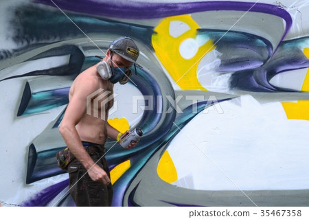 Graffiti on a fence. Graffiti on a fence. 35467358
