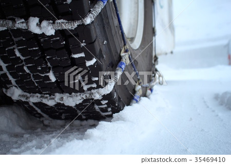 Snow road and tire chain Snow road and tire chain 35469410