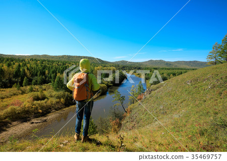 hiking woman enjoy the view in the autumn forest 35469757