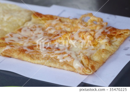 Making of dessert sweet roti 35470225