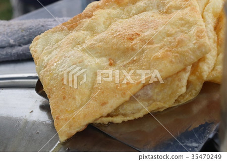 Making of dessert sweet roti 35470249