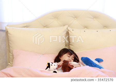 Child pretending to be in bed Child pretending to be in bed 35472570