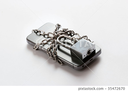 Chain locked smart phone on white background Chain locked smart phone on white background 35472670