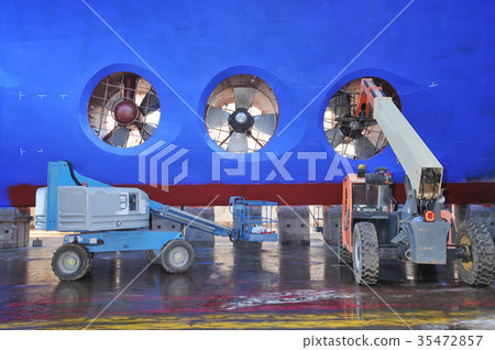Big ship under repairing in shipyard Big ship under repairing in shipyard 35472857