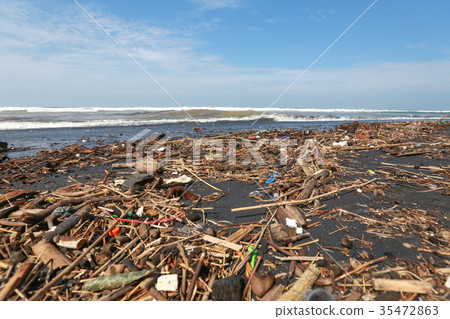 Pollution on the beach of tropical ocean 35472863