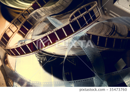 An old film with a movie on the roll. 35473760