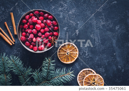 Winter wallpaper with frozen cranberries Winter wallpaper with frozen cranberries 35475061