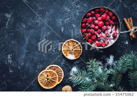 Winter wallpaper with frozen cranberries Winter wallpaper with frozen cranberries 35475062