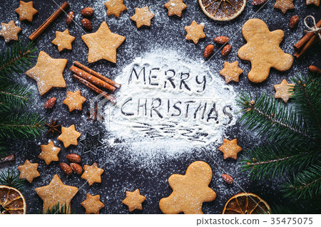Merry Christmas greeting written on flour Merry Christmas greeting written on flour 35475075