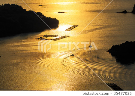Kujukushima Island sightseeing boat and golden sunset Kujukushima Island sightseeing boat and golden sunset 35477025