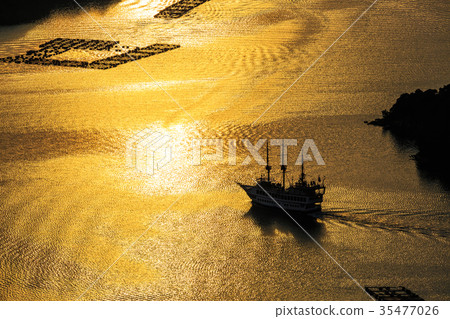 Kujukushima Island sightseeing boat and golden sunset Kujukushima Island sightseeing boat and golden sunset 35477026