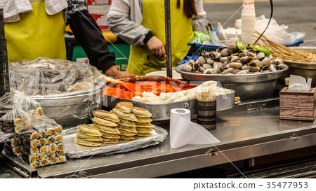 Korean local street food. Gyoza, rice with seaweed Korean local street food. Gyoza, rice with seaweed 35477953