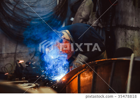Metal Welding with sparks and smoke 35478818