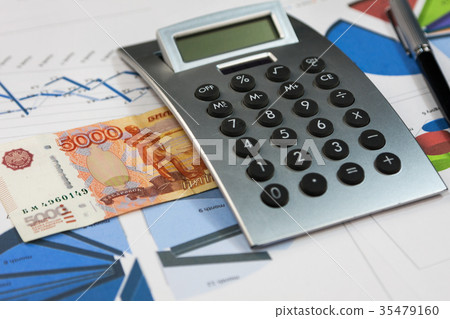 Calculator, five thousand rubles and a pen  35479160