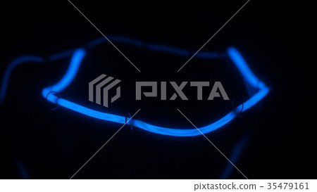 Close-up of a blue spiral of a filament lamp. 35479161