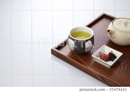 Morning tea and pickled plums 35479241