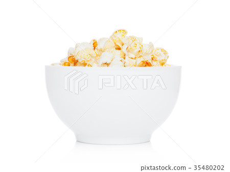 Popcorn salty sweet snack in white bowl Popcorn salty sweet snack in white bowl 35480202