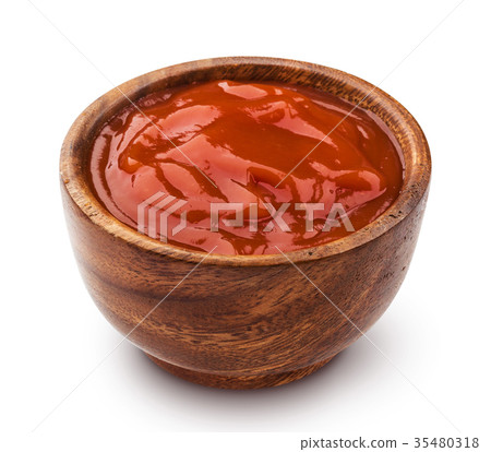 Ketchup in wooden bowl on white background Ketchup in wooden bowl on white background 35480318