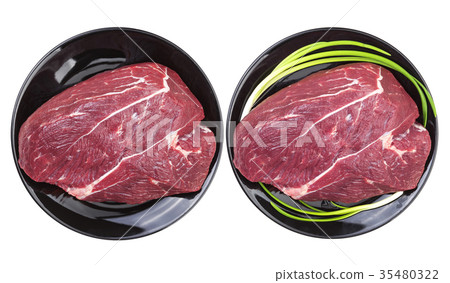 Piece of raw beef on white background, top view Piece of raw beef on white background, top view 35480322