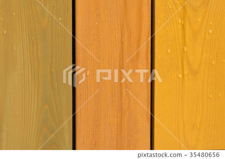 Wet yellow, green color wooden fence pattern Wet yellow, green color wooden fence pattern 35480656