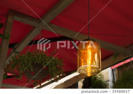 The lamp on the background in cafe The lamp on the background in cafe 35480657