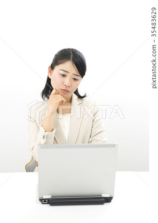 business woman worried about work 35483629