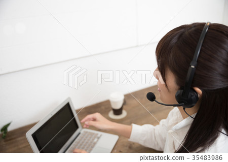 Woman working while calling 35483986