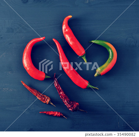 Chilli peppers - fresh peppers and dried pods Chilli peppers - fresh peppers and dried pods 35490082