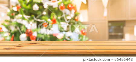 Wooden board table top blur christmas tree. Wooden board table top blur christmas tree. 35495448