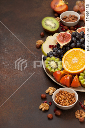 platter with fresh fruits and nuts platter with fresh fruits and nuts 35496486