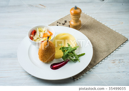 mashed potatoes with salad and greens 35499035