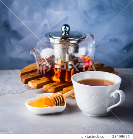 Teapot of red tea and honey Teapot of red tea and honey 35499655