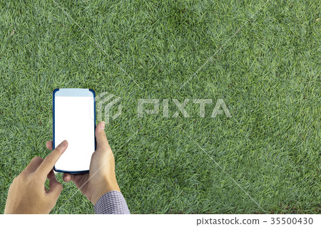 Hand hold smart phone with white blank screen Hand hold smart phone with white blank screen 35500430