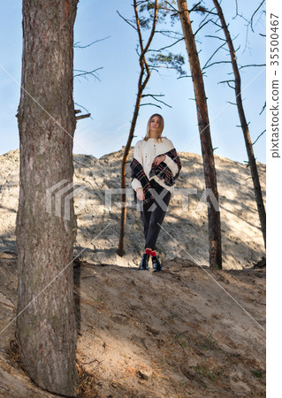 Portrait of a woman in pine forest 35500467