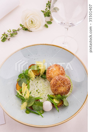 Pike perch cutlets with fried potatoes, a pickles  35501407