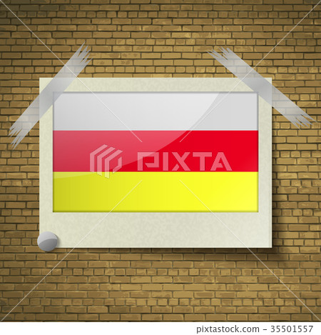 Flags North Ossetiaat frame on a brick background. Flags North Ossetiaat frame on a brick background. 35501557