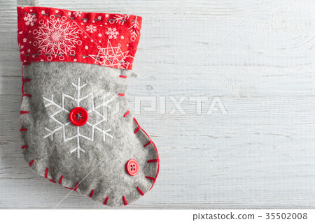 Decorative christmas boot on white background Decorative christmas boot on white background 35502008