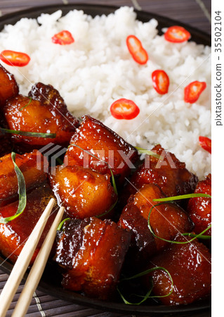 Red cooked caramelized pork with rice macro Red cooked caramelized pork with rice macro 35502104