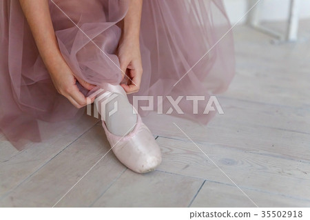 Ballerina puts pointe shoes Ballerina puts pointe shoes 35502918