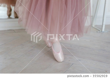 Ballerina puts pointe shoes Ballerina puts pointe shoes 35502919