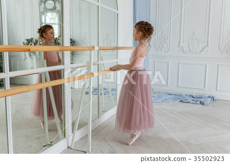 Young ballet dancer in dance class Young ballet dancer in dance class 35502923