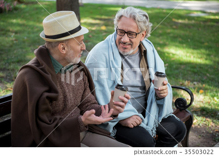 Happy mature pensioners having interesting Happy mature pensioners having interesting 35503022