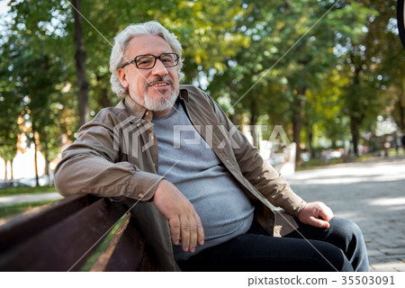 Happy mature man relaxing in the nature Happy mature man relaxing in the nature 35503091