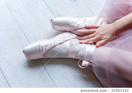 young ballet-dancer sitting on the floor young ballet-dancer sitting on the floor 35503102