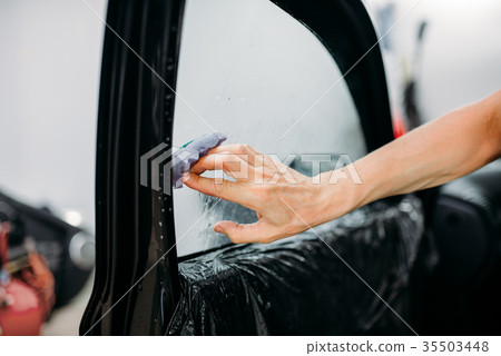 Specialist with drier, tinting film installation Specialist with drier, tinting film installation 35503448